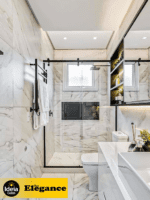 Box Elegance de vidro temperado incolor com estrutura metálica e roldanas aparentes na cor preta, sendo 1 folha fixa e 1 porta de correr.