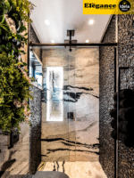 Box Elegance de vidro temperado incolor com estrutura metálica e roldanas aparentes na cor preta, sendo 1 folha fixa e 1 porta de correr.